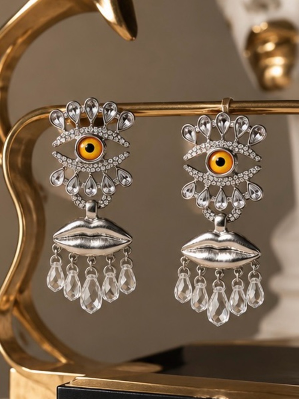 Surreal Eye & Sculpted Lips Crystal Earrings